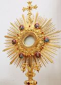 A monstrance containing a Sacred Host, exposed for Adoration