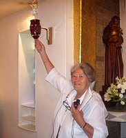 Majella Taylor with the altar lamp she engraved